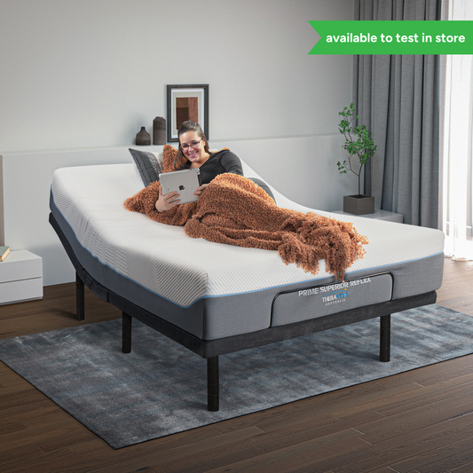 Woman relaxing on the Adjustapedic 6.0 adjustable bed with head and foot elevation for reading and comfort — Sleepdoctor Australia