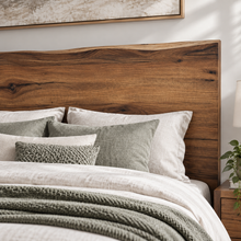 Load image into Gallery viewer, A rustic wooden bed headboard with a live edge, styled with white and sage green bedding, pillows, and a textured throw blanket in a bright bedroom setting.