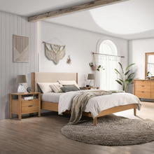 Load image into Gallery viewer, Miller bedframe - featuring an upholstered bedhead and oak timber finish