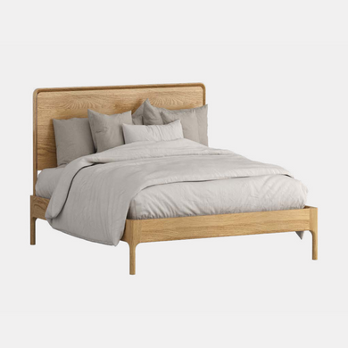 evans oak bedframe with rounded finishes
